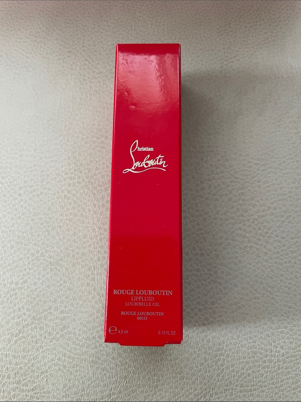 Christian Louboutin Lip Fluid in Bright Red Packaging